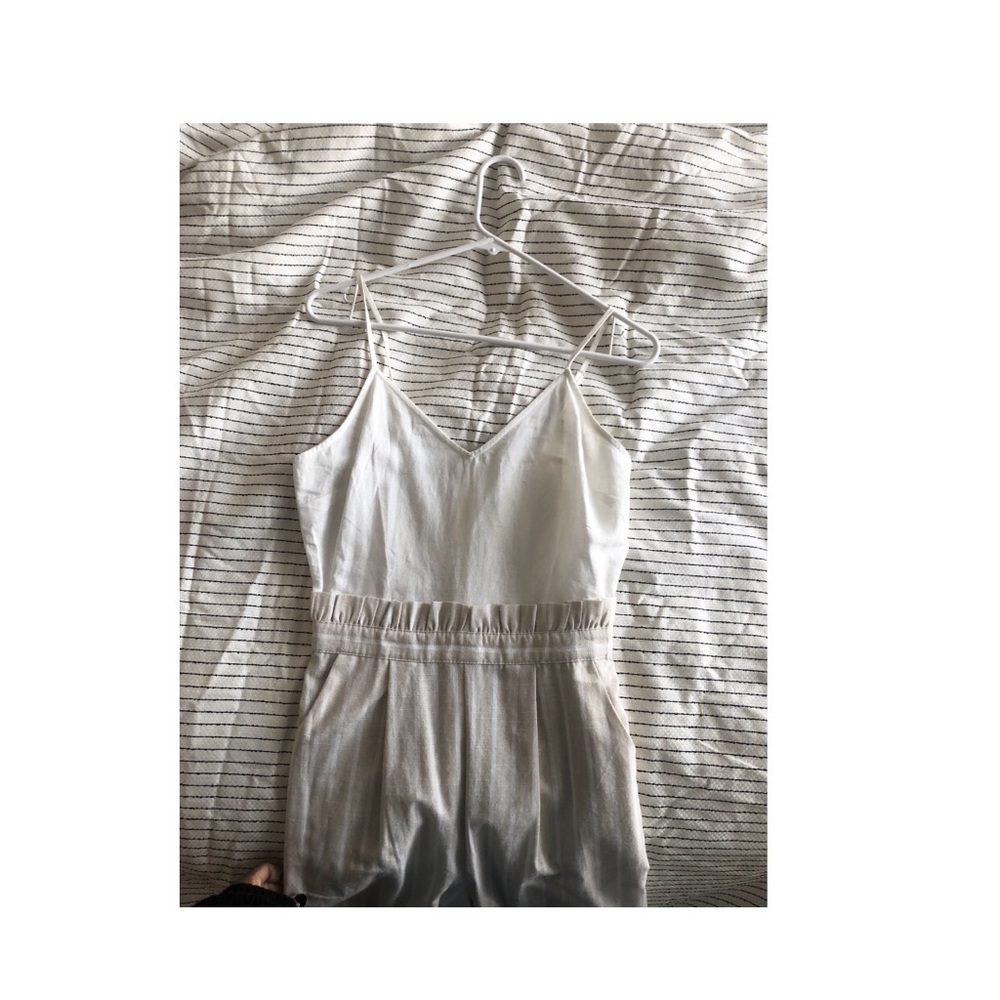 Cream/beige jumpsuit.